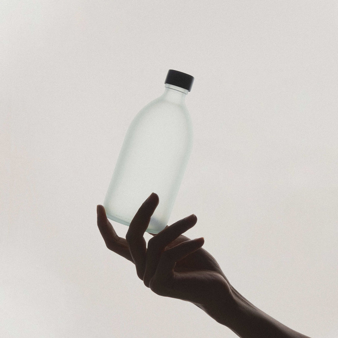 White Glass Bottle and Cap
